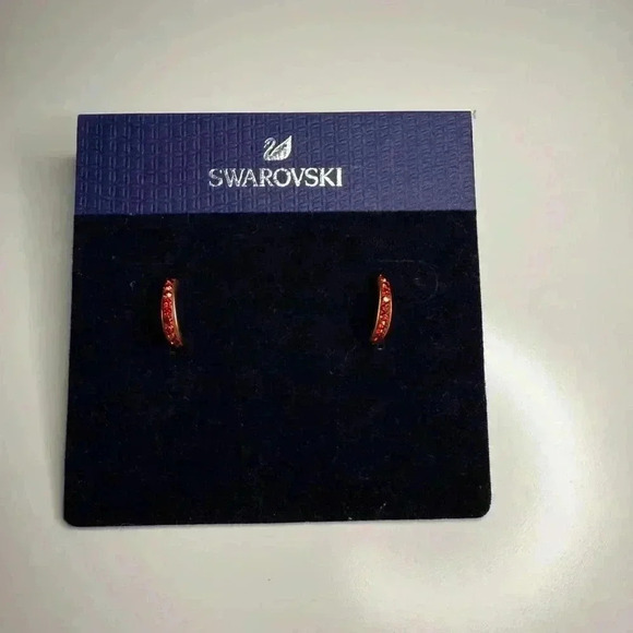 Swarovski Jewelry - SWAROVSKI red and gold hoops!